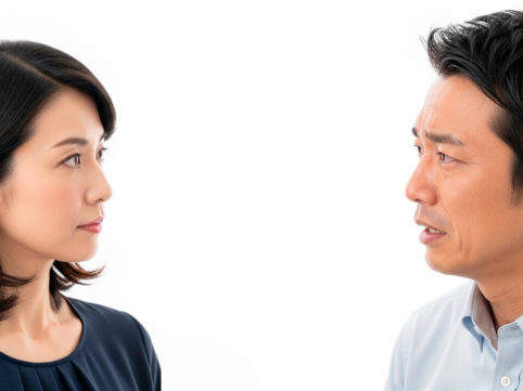 冷静に会話する女性と感情的な男性 AI生成